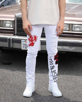 Graffiti Style White Embroidered Ripped Jeans