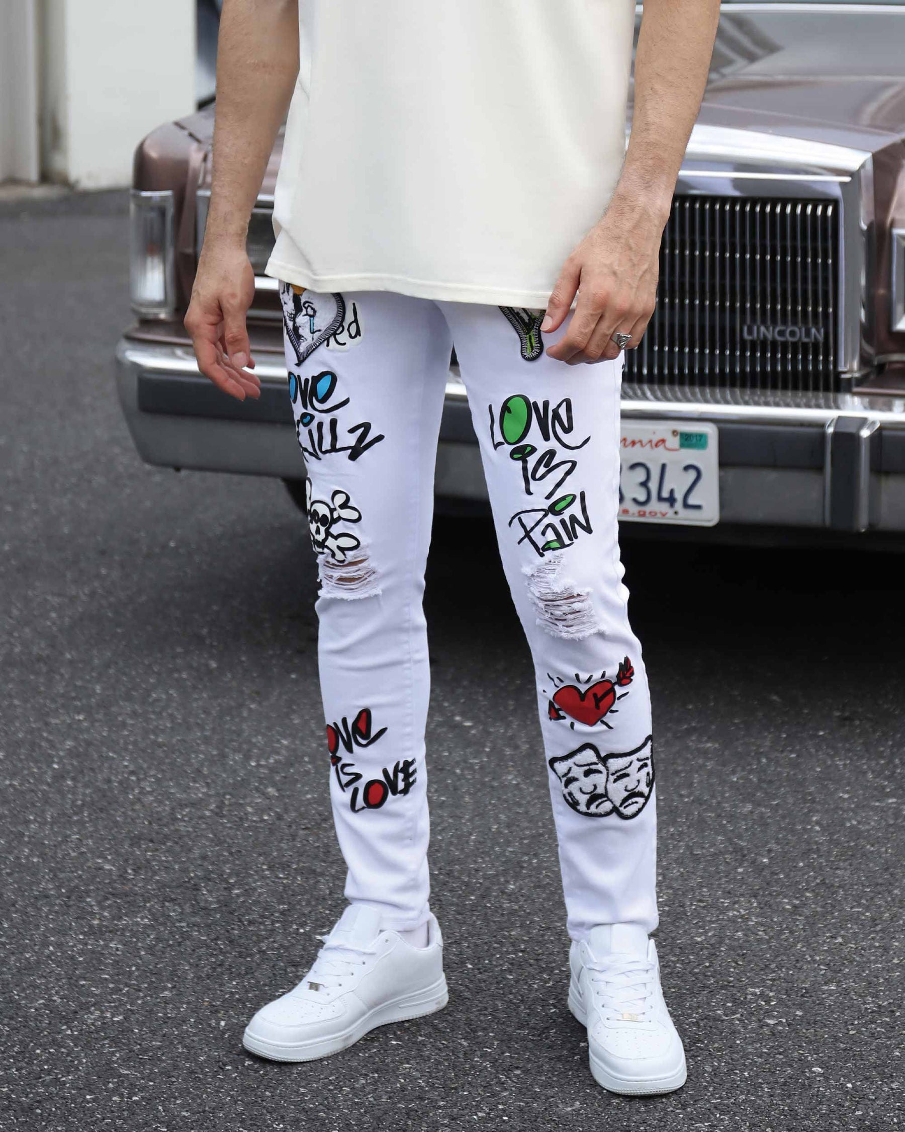 White Ripped Jeans with Colorful Graffiti