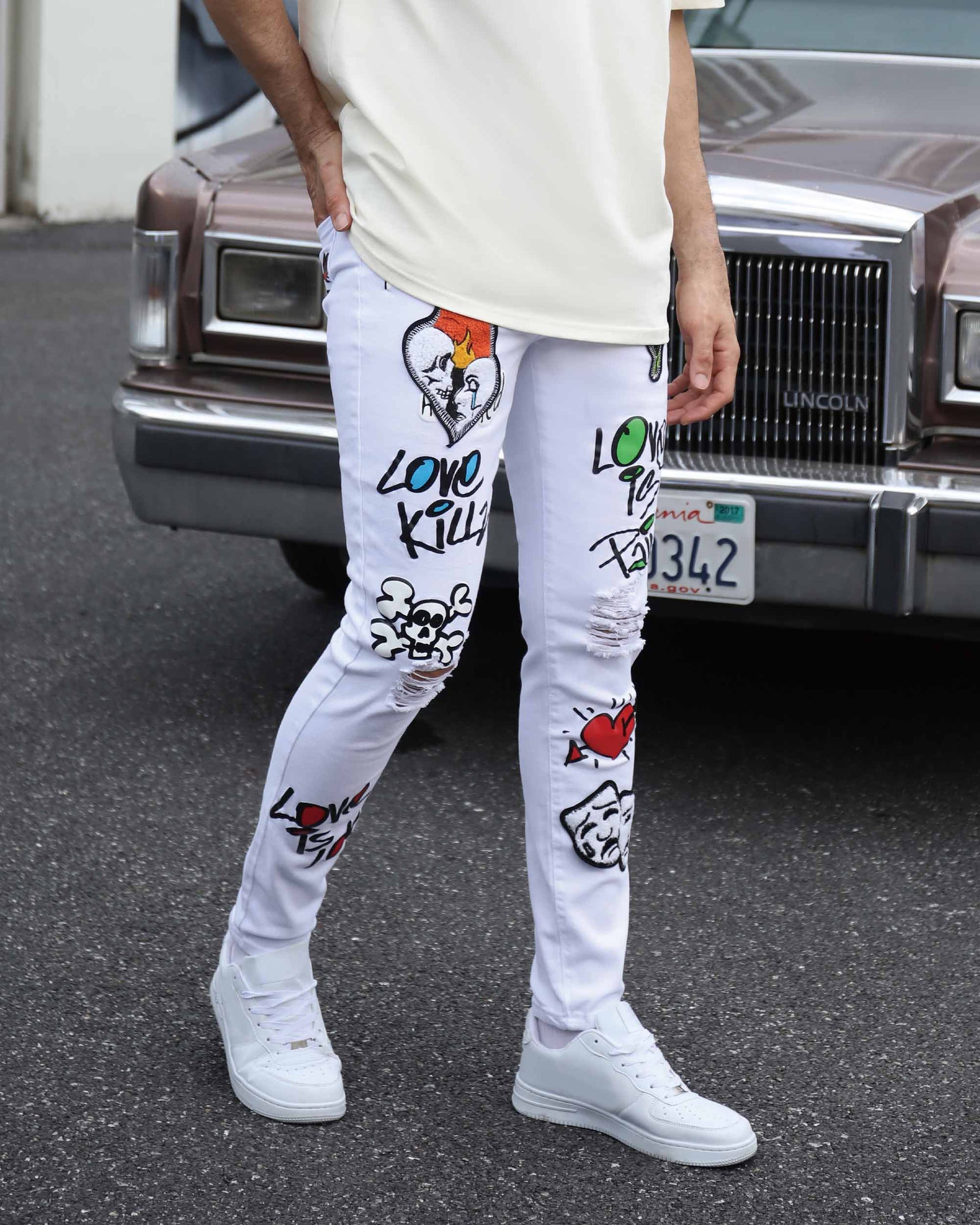 White Ripped Jeans with Colorful Graffiti