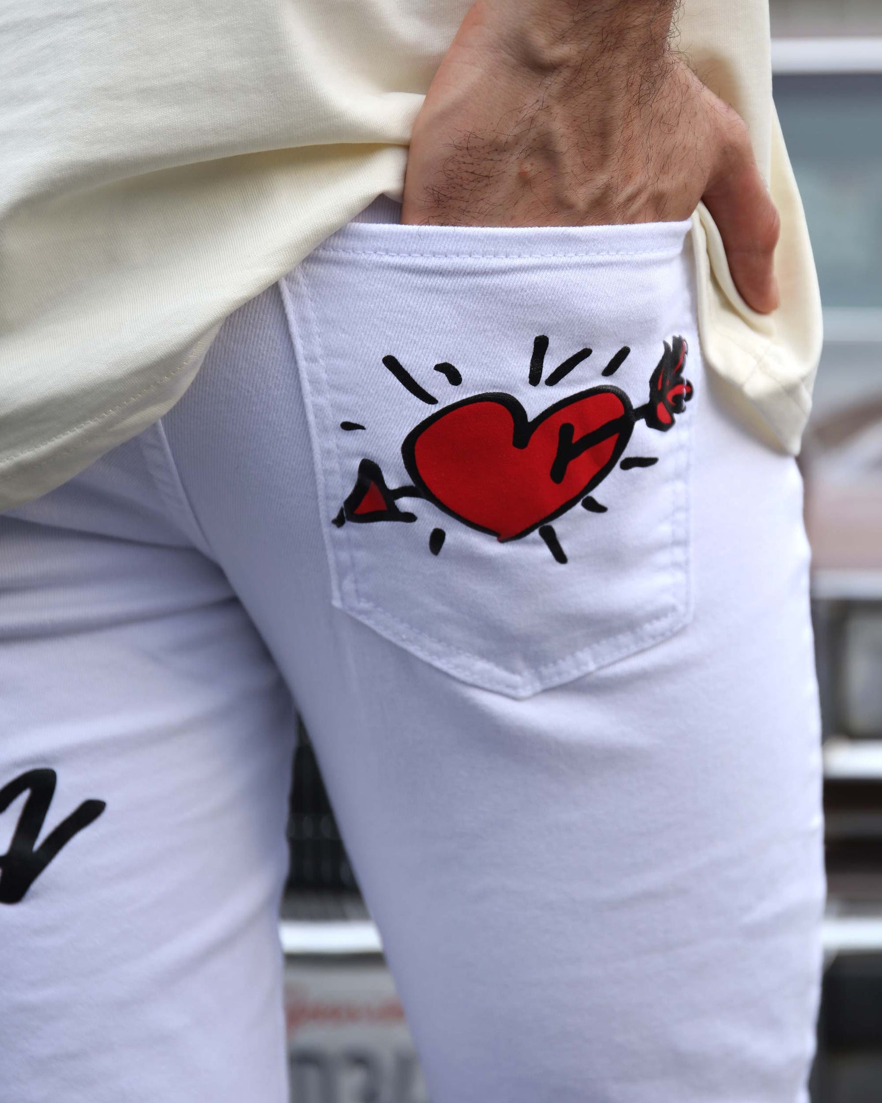 White Ripped Jeans with Colorful Graffiti