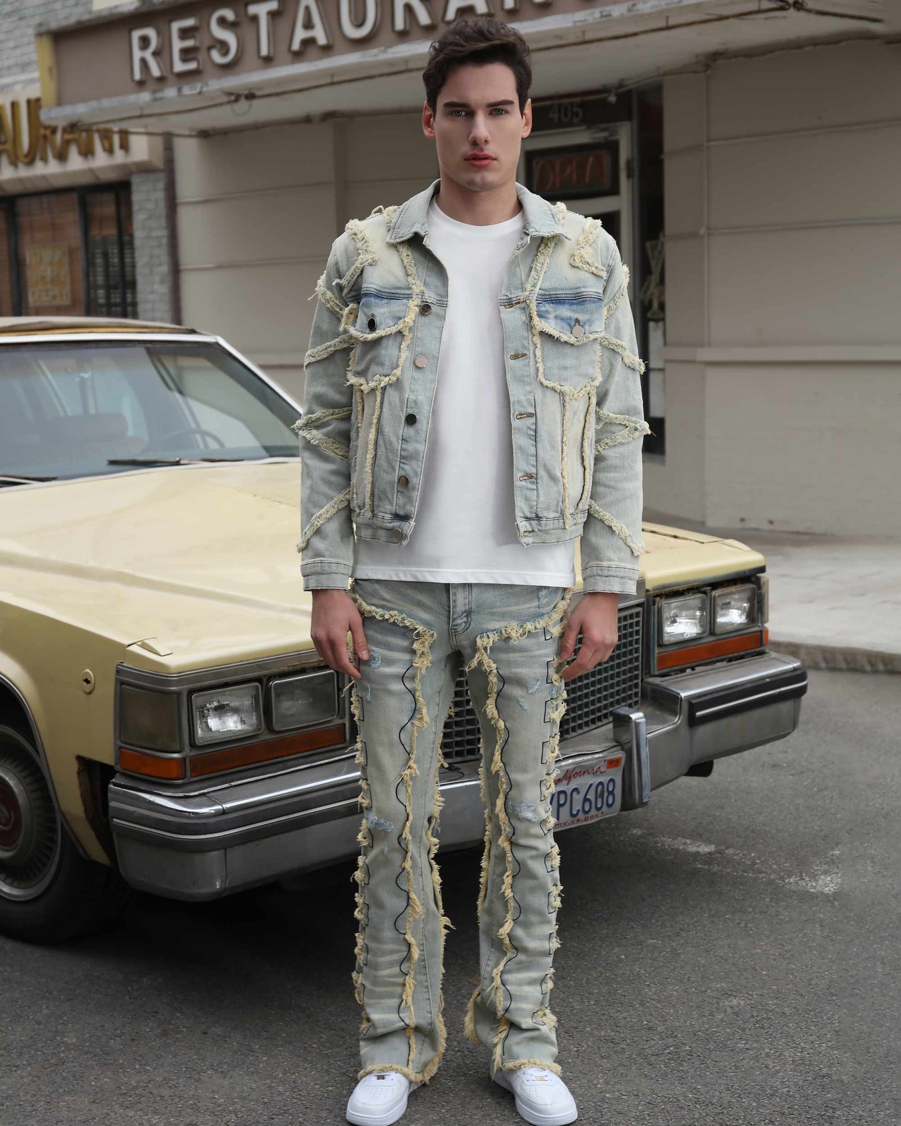 Vintage Blue Denim Jacket with Ripped Stitching