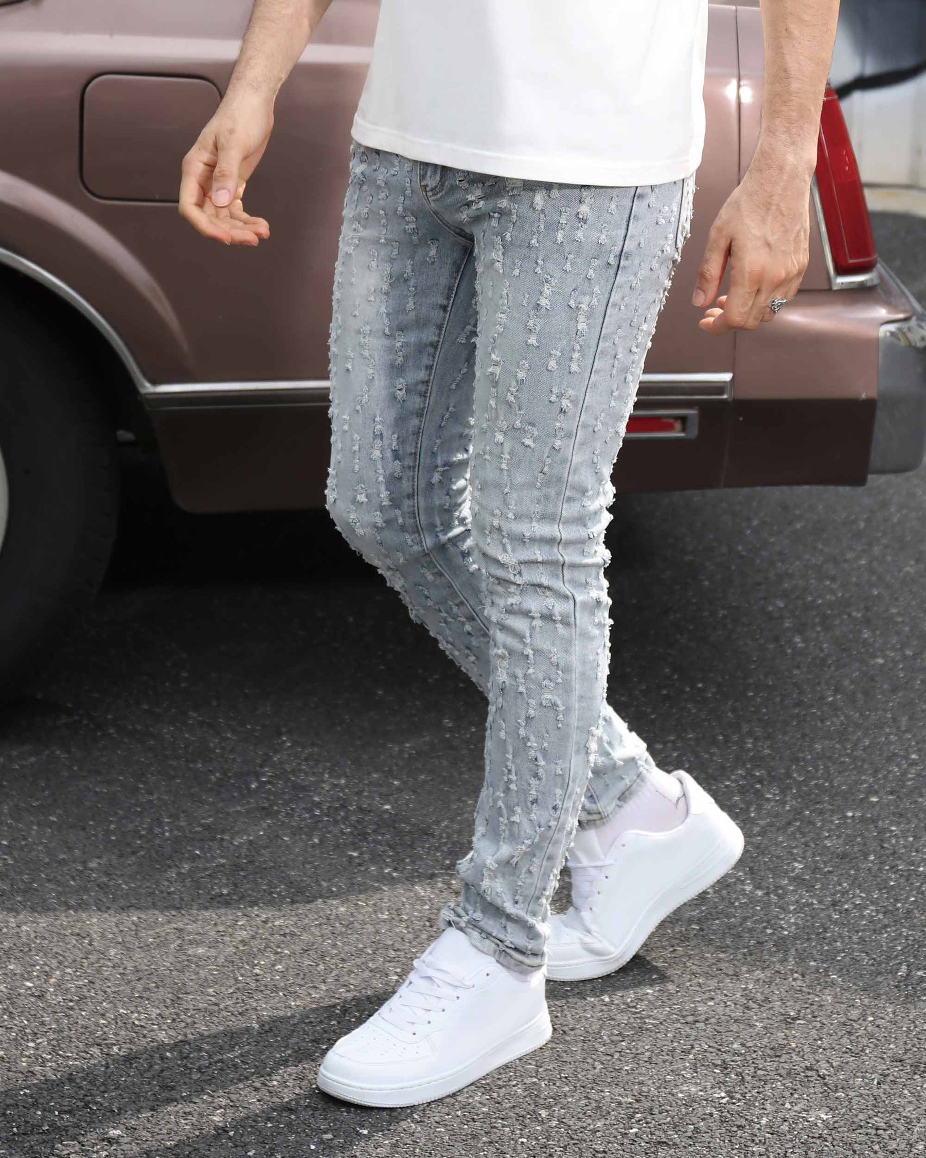 Logeqi Slim Fit Light Wash Blue Ripped Jeans with Small Rips