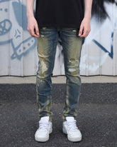 Irregularly Distressed Dark Wash Slim Fit Blue Ripped Jeans