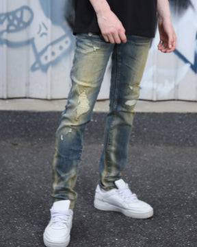 Irregularly Distressed Dark Wash Slim Fit Blue Ripped Jeans