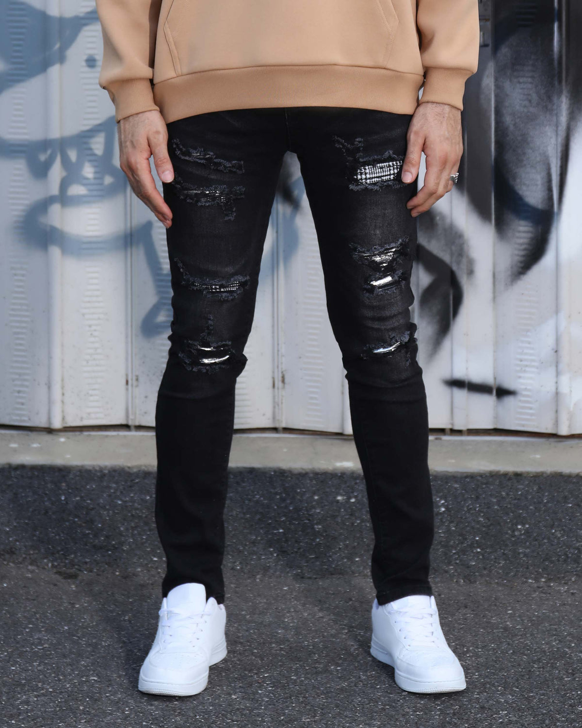 LOGEQI Black Ripped Jeans with Bold Rips and Plaid Patch