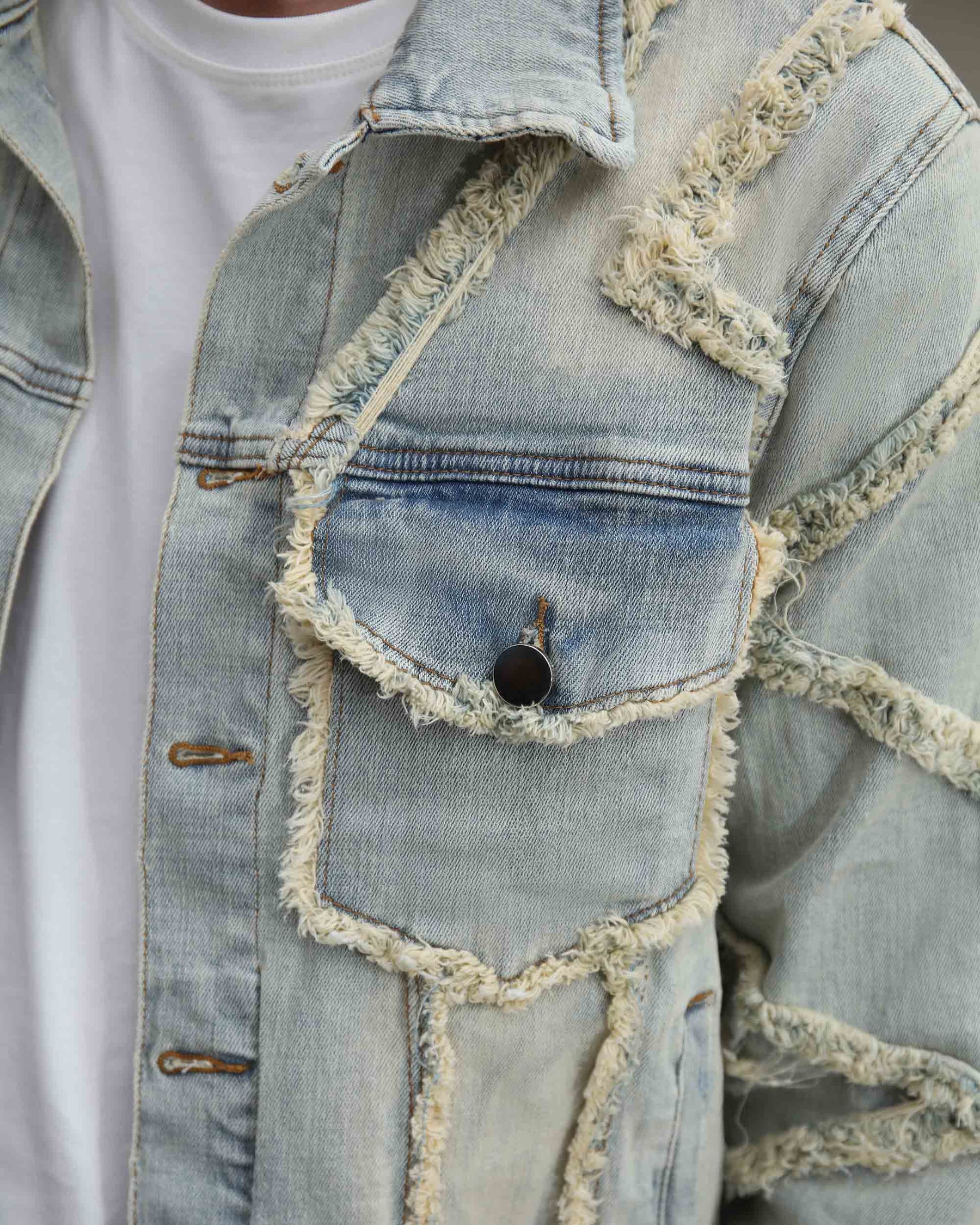 Vintage Blue Denim Jacket with Ripped Stitching