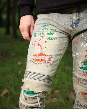 Hip-Hop Style Distressed Ripped Blue Jeans with Graffiti Style