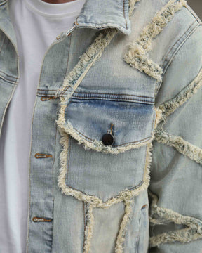 Vintage Blue Denim Jacket with Ripped Stitching