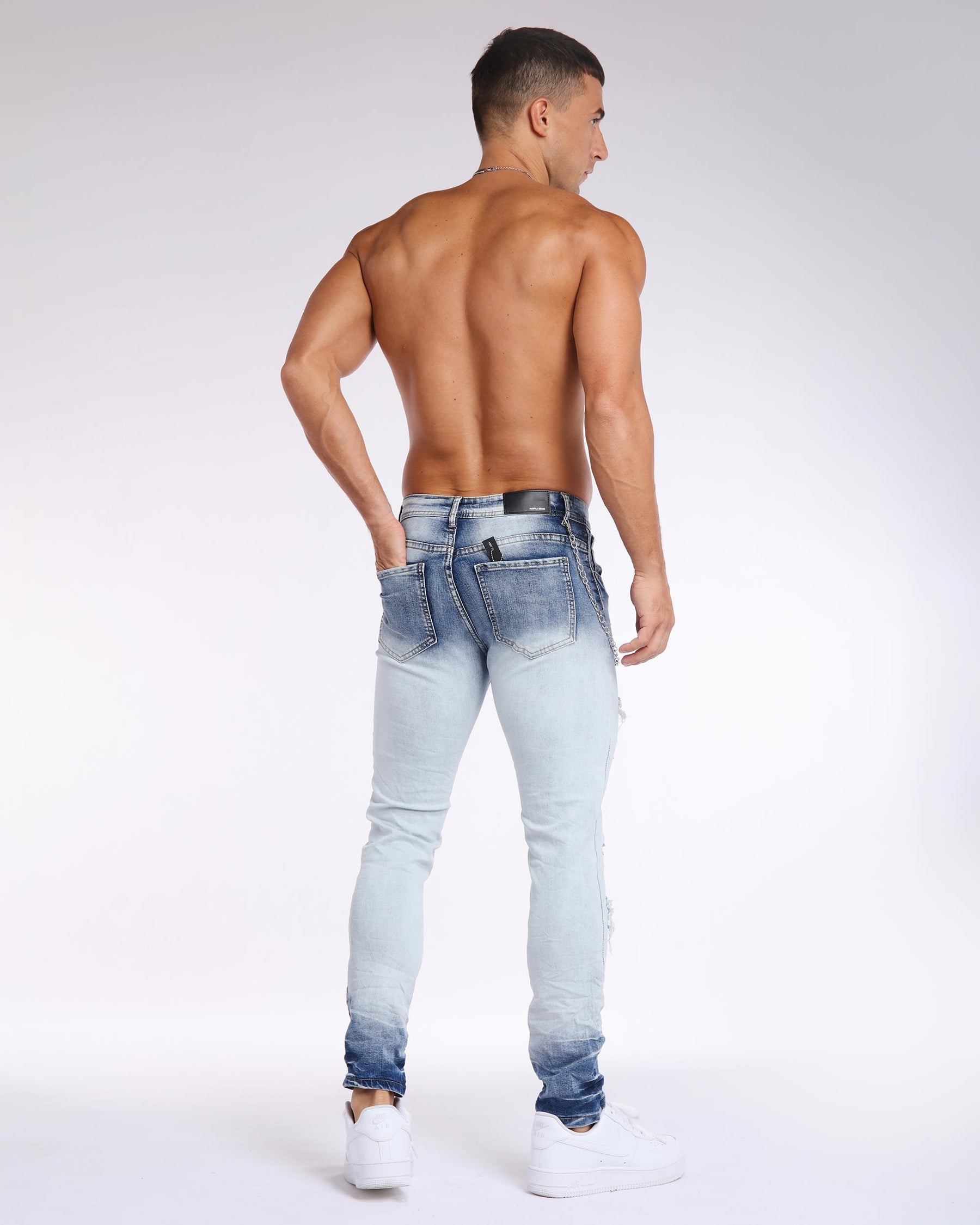 LOGEQI Slim Fit Blue Ripped Jeans in Light Wash