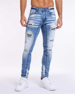 LOGEQI Spray Painted Ripped Blue Jeans in Light Wash